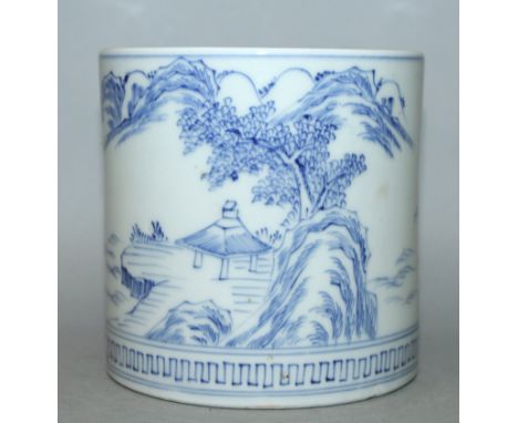 A 19TH/20TH CENTURY JAPANESE BLUE & WHITE PORCELAIN BRUSHPOT, the sides painted in a Chinese style with a continuous river la