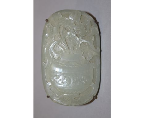 A GOOD QUALITY 18TH/19TH CENTURY CHINESE CARVED OVAL CELADON JADE PLAQUE, the rounded upper surface well carved in relief wit