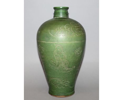 A CIZHOU STYLE GREEN GROUND CERAMIC VASE, the sides incised with Immortals and flowerheads, 11.2in high.