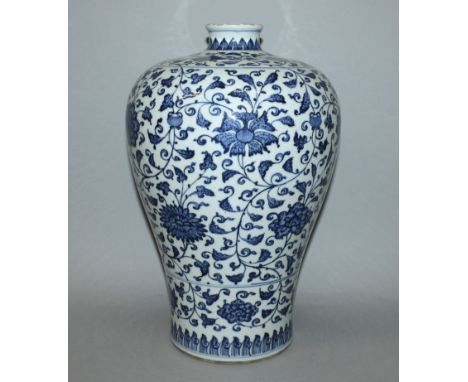 A LARGE CHINESE MING STYLE BLUE & WHITE PORCELAIN MEIPING VASE, decorated with an overall design of scroll and leaf stemmed f