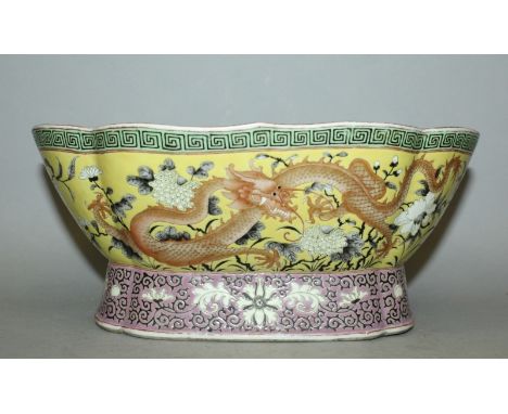 A FINE QUALITY CHINESE YELLOW GROUND ENAMELLED PORCELAIN DRAGON BOWL, seal mark of Jiaqing and possibly of the period, the si