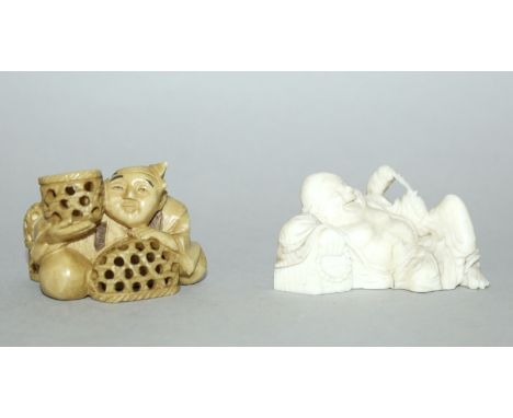 AN EARLY 20TH CENTURY SIGNED JAPANESE STAINED IVORY NETSUKE OF A BASKET SELLER, 1.6in wide & 1.25in high; together with an ea