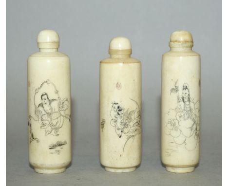 A GROUP OF THREE EARLY 20TH CENTURY CHINESE IVORY SNUFF BOTTLES, each finely decorated with stained engraved decoration, each