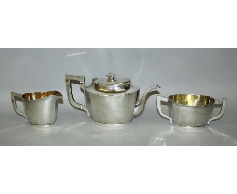 A GOOD EARLY 20TH CENTURY CHINESE SILVER TEA SERVICE BY LUEN HING OF SHANGHAI, weighing 985gm in total, comprising a teapot, 