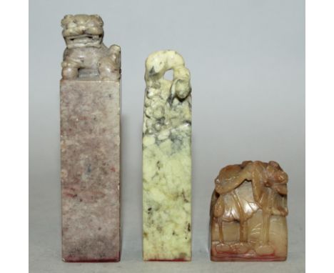 A GROUP OF THREE EARLY 20TH CENTURY CHINESE SOAPSTONE SEALS, one seal with a Western name, the tallest 4in high. (3)