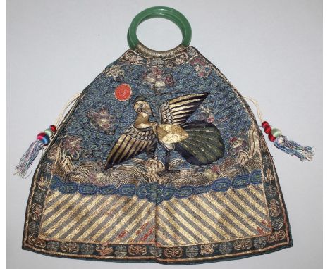 A PAIR OF 19TH CENTURY GOLDEN PHEASANT CHINESE RANK BADGES, formed into a bag with jade-like ring handles, part of the decora