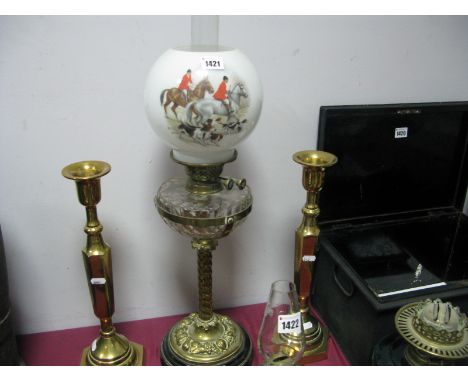 A XIX Century Oil Lamp, with a glass funnel, shade and well, brass barley twist column on a block base, together with a pair 