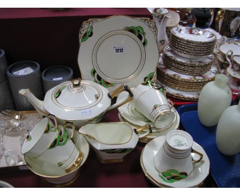 Tuscan Plant Art Deco Tea Service, of eighteen pieces, manufactured for Harrod's, including tea pot.