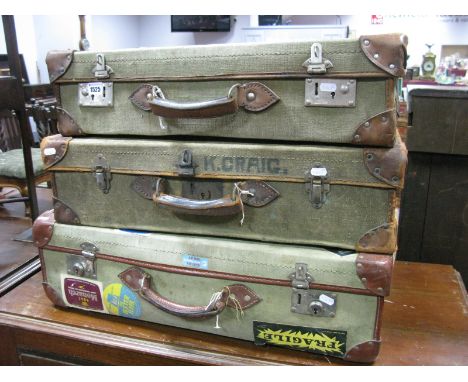 Three Vintage Leather and Canvas Suitcases.