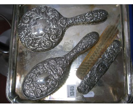 A Hallmarked Silver Backed Hand Mirror and Hair Brush; together with a further brush (damages) and a square plated tray, init