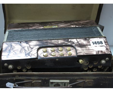 A Hohner Accordion, (cased).