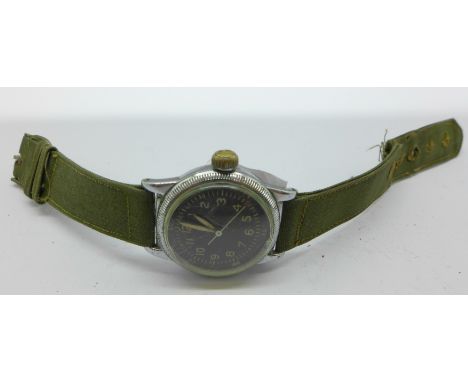 A Waltham U.S. Army issue wristwatch, type A-11, with hack, original strap