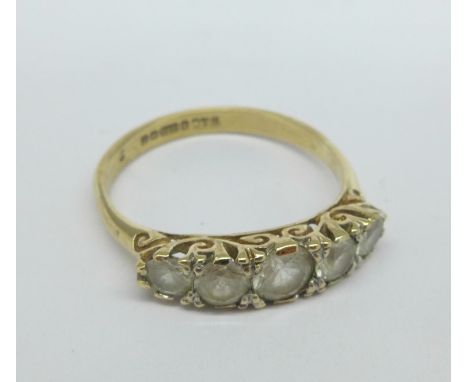 A 9ct gold and five stone ring, 2.4g, P