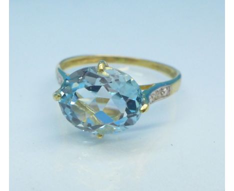 A 9ct gold and blue stone ring, 1.8g, N