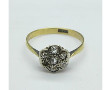 An 18ct gold, diamond cluster ring, missing one stone