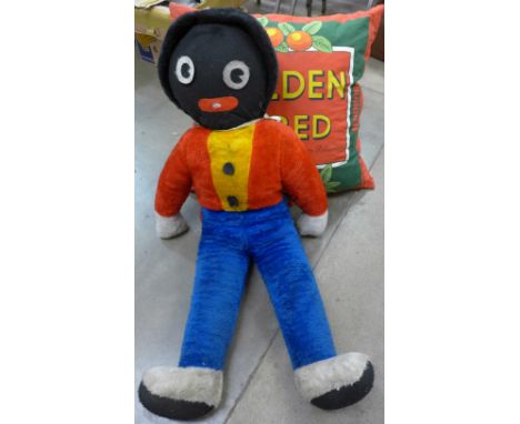 A large Robertsons soft toy, 115cm and a large Golden Shred cushion, 75cm x 70cm