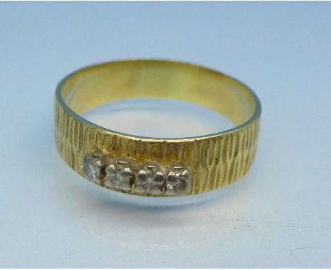 An 18ct gold and diamond ring, 3.7g, R