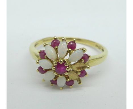 A 9ct gold, ruby and opal cluster ring, 2.5g, Q, two opals missing