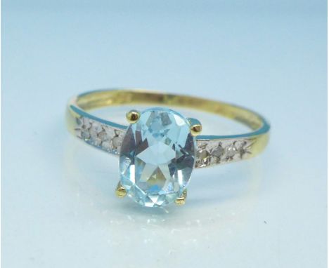 A 9ct gold and blue topaz ring, 1.2g, O