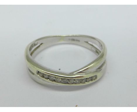 A 9ct gold and diamond ring, 2.3g, O
