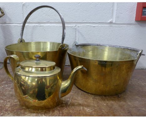 Two brass jam pans and a brass teapot, 6.56kg