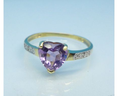 A 9ct gold, amethyst and diamond ring, 1.2g, O