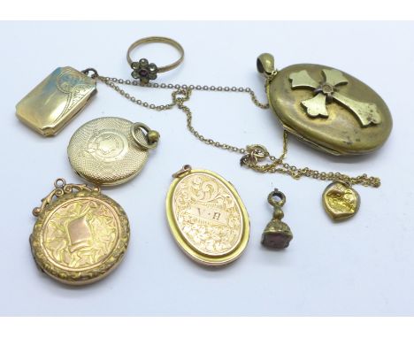 Five lockets, a ring, a small seal and a small pendant
