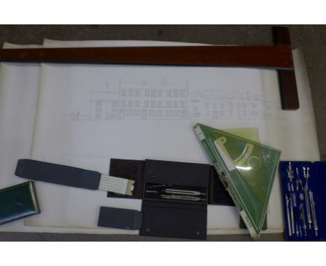 Three cased sets of drawing instruments, a draughtsman's T-square, a slide rule, other drawing instruments and two technical 