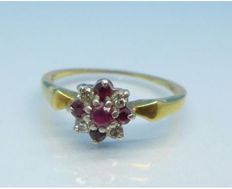 An 18ct gold, platinum set ruby and white stone ring, 2.5g, L