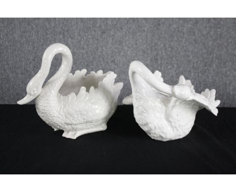 Two white ceramic planters. Stamped made in Italy and signed indistinctly by the maker. H.30cm. (largest) 