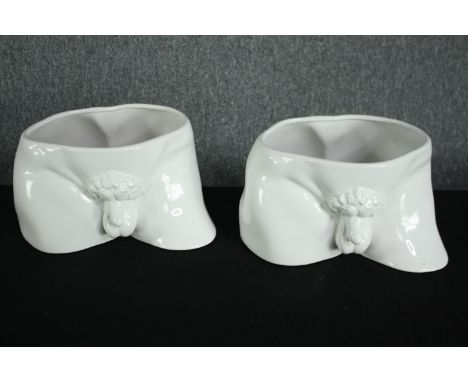 Two ceramic planters. In the form of two sections of a classical statue. H.19 W.28 D.21cm. (each) 