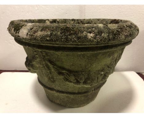 An old composite stone garden planter. Well aged and worn. H.34 Di.48cm. 