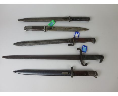 A German 1884/98 Pattern Mauser Knife Bayonet in scabbard, an 1898-05 1st Pattern Mauser Bayonet, a Prussian M71 1871 Pattern