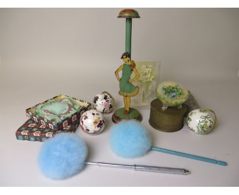 A blue Powder Puff on telescopic metal stick, boxed, a 30's printed chiffon handkerchief and puff, boxed, and a yellow puff w