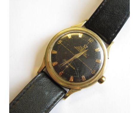 A Gentleman's Omega Automatic Constellation Wristwatch, the black textured dial with arabic numerals and chevron markers and 