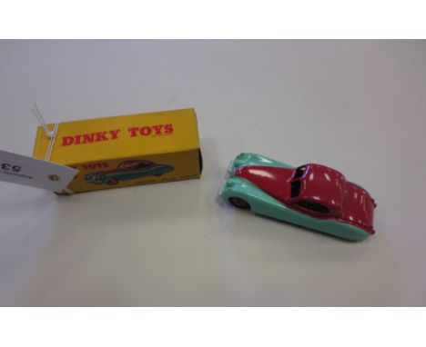 A boxed Dinky Toys No. 157 light blue and red Jaguar XK120