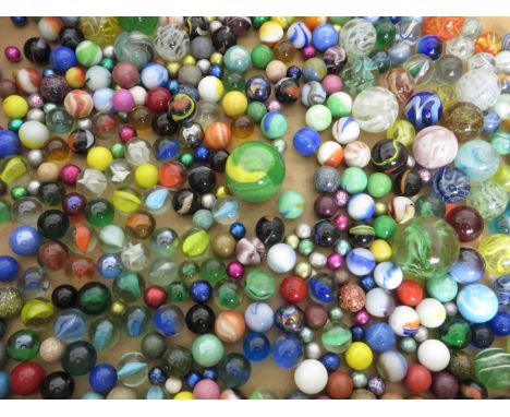 A large quantity of glass and ceramic Marbles, some large, various dates