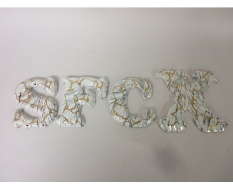 Twenty four ceramic Letters with blue marbled and gilt designs