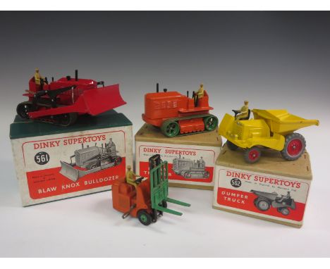 A boxed Dinky Supertoys No. 561 Blaw Knox Bulldozer, a boxed No. 562 Dumper Truck, boxed No. 563 Heavy Tractor and an unboxed