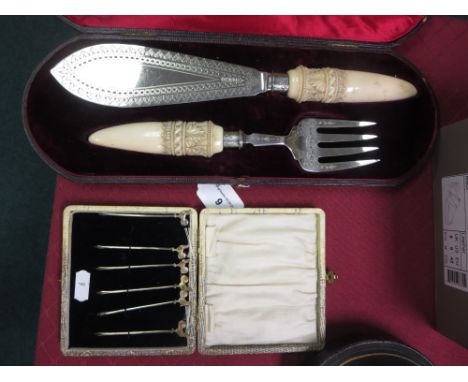 A pair of Victorian silver Fish Servers with engraved blades and carved ivory hafts, Sheffield 1880, and six cockerel Cocktai