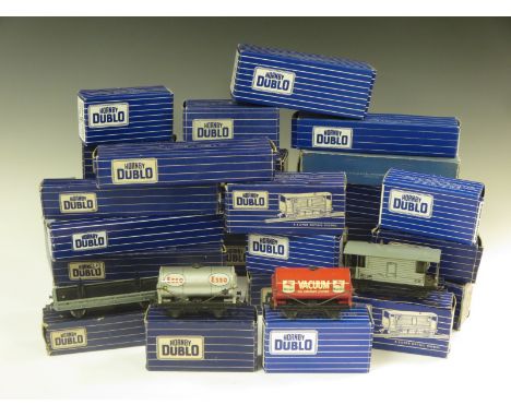 Thirty  boxed Hornby Dublo 3-rail Trucks including D1 Tank Wagon, Mineral Wagon, Esso Wagon, M.R. Brake Van, Mobil Wagon, Bol
