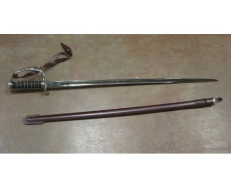 An Elizabeth II Officer's Sword in leather scabbard with leather carrying case