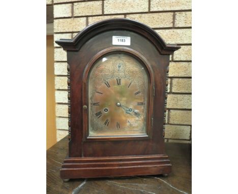 A Black Forest Bracket Clock with arched dial, subsidiary silent/chime dial, in mahogany case, 17in