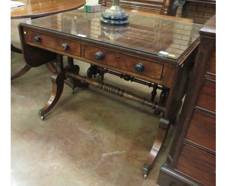 An early 19th Century mahogany Sofa Table fitted two frieze drawers on cheval base and a Dressing Mirror