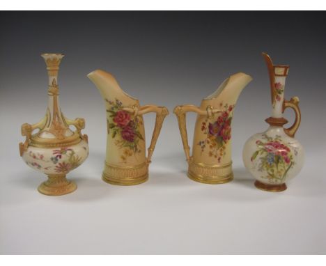 A pair of Royal Worcester Tusk Jugs painted floral designs on blush ivory ground, a two handled baluster Vase (restored) and 