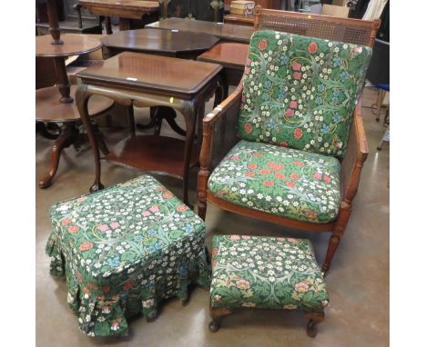 A satinwood bergere Armchair with fluted tapering front supports, A/F, a Footstool and Pouffe with matching upholstery