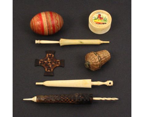 A mixed lot - sewing - comprising three furled umbrella form needle cases, a Tunbridge stick ware silk winder, a sea grass ba