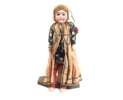 A Handwerck porcelain headed doll, open mouth marked 'Made In Germany/H/0_', composition body, 50cm 