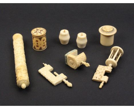 A mixed lot - sewing - ivory - comprising three variant Chinese carved ivory clamps, a similar cylinder netting case with too