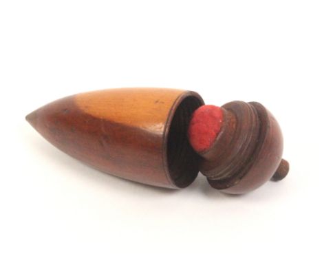 An early 19th Century fruitwood pin poppet/thimble case of turned tapering form, 7.5cm